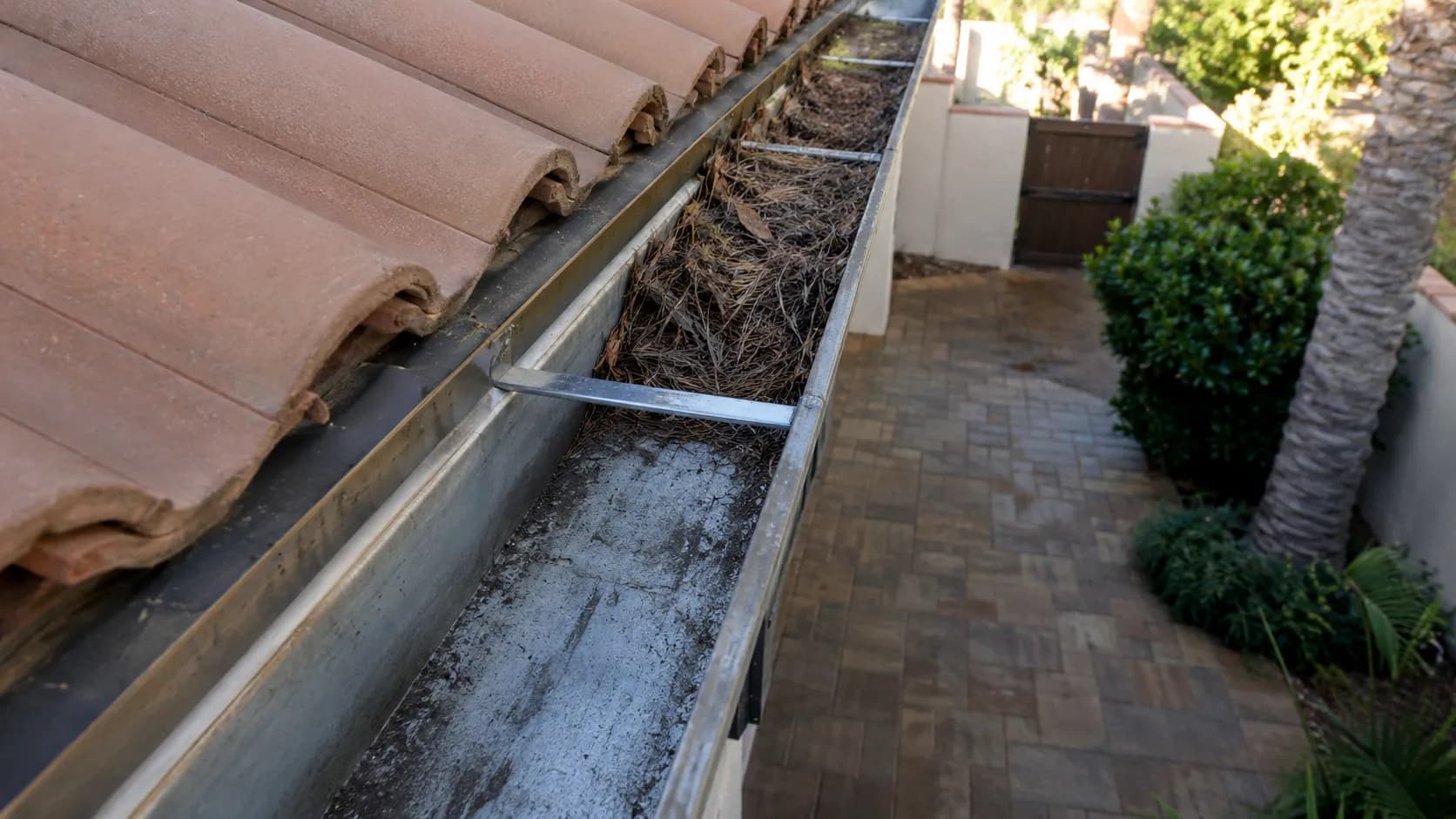 How Clogged Gutters Cause Expensive Water Damage (and How to Prevent It)